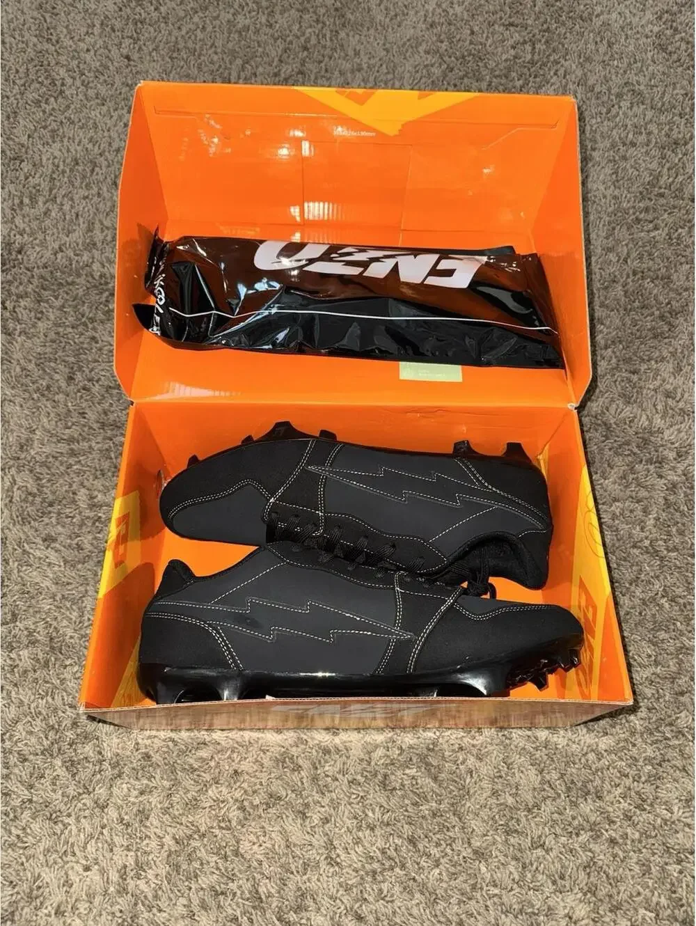 NIB Phantom Black Enzo Cleats.  Size 14 NEW!